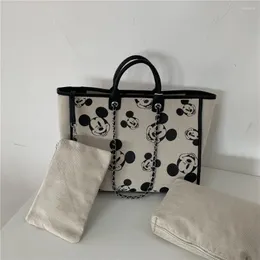 Drawstring yüksek kaliteli tuval bayan omuz çantası 2024 büyük kapasite siyah ve beyaz gündelik moda karikatür baskı crossbody çanta