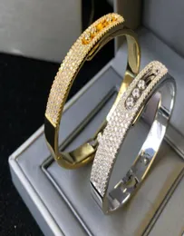 Bröllopsrullande smycken 3 Stone Moving Armband manschett Tre Cz Crystal Diamond Gliding Move Bangled rörde sig berömd designer J6968784