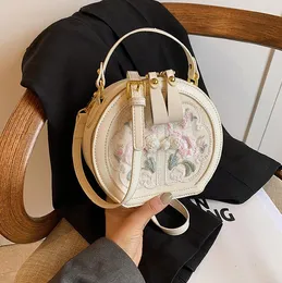 Bolsa de ombro de vendas de fábrica pequena fã de palácio fresco Bolsa bordada doce Lady Lady Round Moda