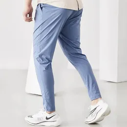 Pantaloni da corsa da uomo che facevano jogging sportivo pantaloni della tuta a secco rapido per pista elastico pantaloni di fitness di fitness addestrati da pantaloni sportivi uomini 240420