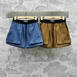 Frauen -Shorts -Designerin Frühling/Sommer Neue Miu Nanyou Gaoding lässig und minimalistischer Stil großer Taschenwebelgurt Workwear Lose Short Jeans 1Bn9