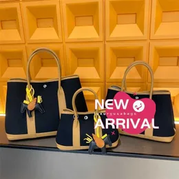 Designer Totes 7a Garden Party Bag äkta duk skarvning duk kohud kvinnans handväska kapacitet äkta läder axelqq med logotyp