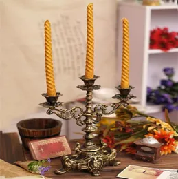 Candelabra de ferro fundido decorativo Candlestick 2 braço 3 Pillar de metal leve Punto de vela de casla de casamento mesa de mesa de Natal Dec1454423