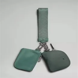 Anahtarlıklar kordonlar tasarımcı marka metal çift çantalı bileklik pochette çift kayış su geçirmez mini yoga çantası çıkarılabilir anahtar zinciri