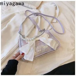 Miyagawa estilo coreano Bolsa de baguete de arco de arco fofo para 2023 feminina nova pérola de pérola submazio de travestia A9jt#