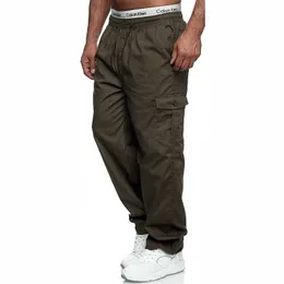 Mäns byxor Mens Cargo Pants Relaxed Fit Sport Pants Jogger Sweatpants 2023 Ny Loose DrawString Outdoor Fashion Multiple Tickets Byxor Y240422