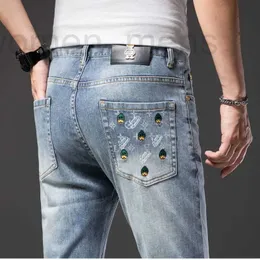 Męski projektant dżinsów dżinsy haftowane nadruk małe stopy szczupłe modne koreańskie letnie spodnie Elastyczne vlvs