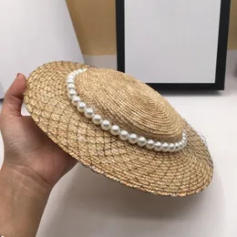 Straw Ladies Pearl Mesh Decoração Chapéus de palha retro praia Sun Sombro feminino Caps de verão gril moda elegante wide borrac hat 240418