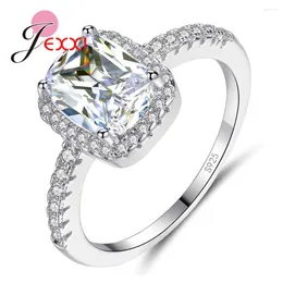 Med sidogenar Jexxi Big Promotion Clear Cubic Zirconia Högkvalitativ S90 Silver Kvinnlig kvinnlig bröllopsengagemang Finger Rings Crystal
