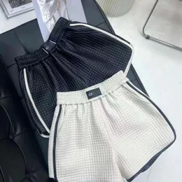 Designer de calças curtas do arco triunfal Celiene de alta qualidade de luxo shorts de couro waffle perna larga larga e confortável calça preta branca s-2xl