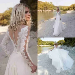 Bohemian Beach Wedding Dresses V Neck Long Sleeve Lace Appliques Pearls Brudklänningar En linje Boho Wedding Dress Robe de Mariee