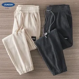 Pantaloni maschili in stile americano bo'ao sanitario in primavera estate abiti da lavoro luminoso core lussureggiante e casual leggings sport