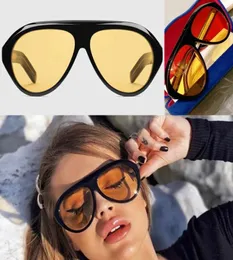 Womens Black Frame Yellow Lens Progettista Solglasögon 0479S Women Fashion Classic Beach Vacation 2021SS Eyewear Women UV 400 med 3573575