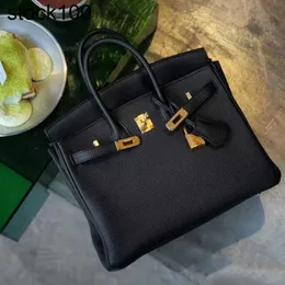 Platin çanta paketi 2024 kadın çantası çok yönlü çanta büyük kapasiteli bir omuz crossbody gelişmiş his el yapımı gerçek deri