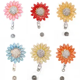 Nyckelringar Mticolor Rhinestone Crystal Infällbara ID -rullar Sier Plated Sunflower Badge Holder For Nurse Doctor Lärares gåva Drop Del DH7T4