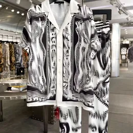 2024 Sommar Nytt slingrande modepar Hemkläder Kort ärm Långa byxor Drawstring Design Fashion Personality Suit