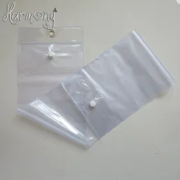 Bolsas 50pcs sacos de PVC de plástico para embalagem de sacos de embalagem transparentes de extensão de cabelo com cabide superior e botão inferior