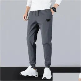 Mens Pants Fashion Designer Sweatpants Sports High Quality Cotton Jogger Running Casual Quick Drying Fitness Street Drop Delivery Appa Otudi