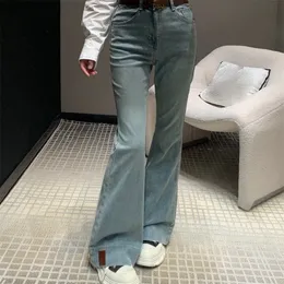 Kvinnors jeans designer byxor vår och sommar klassiker enkel hög midja smala tunna blossade byxor anpassade logotyp mönster bälte