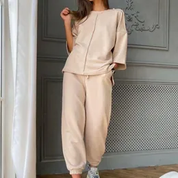 Тректальный костюм Women 2 Piece Sets Comfy Tistbits Sport Charging Set Set Track Suit Summer одежда с коротким рукавом футболка костюмы 240423