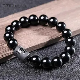 Perlen 10 mm natürlicher schwarzer Obsidian geschnitzter Buddha Lucky Amulett kreisförmige Perlenhalle Armband