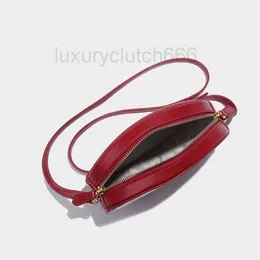 Lady Bags Cel Mini Bun Bun Lady Dermis Designer de painéis de lua -de -moo Red Cel Mini Bag Womens Advanced Sense 2024 Small Round Saco Moda Versátil One ombro Cross 5Cef