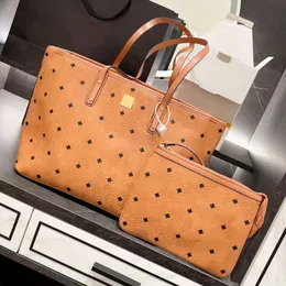 Luxurys Luxurys Handbag Mommy Clutch Shop Bag Bag Womens Mens كتف Pochette Shopper Bag Bag Gronder Assigner Bags MC Top Handle Geater Leather Weeken Cross Base Bag