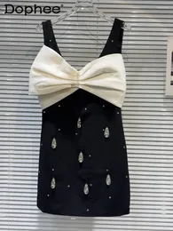 Abiti casual Elegante socialite Big Bowknot Abito nero senza maniche decorativo 2024 Summer a forma di goccia Diamante Donne Donne Mini