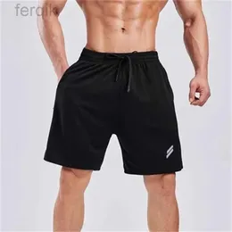 Shorts masculinos shorts de fitness de verão homens calças de moletom com elástico solto shorts de secagem rápida Treinamento de malha de basquete shorts Men D240426