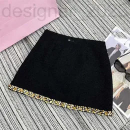 Designer de saias 24 Coleção da primavera Early Diamond Bead Edge tweed grossa pequena letra de meia saia Marca saia