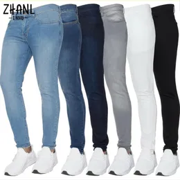Mens elastico jeans skinny moda elastico cotone slim jeans pantaloni maschio panelli a matita più dimensioni pantaloni di colore puro casual 240412