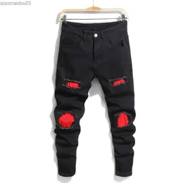 Jeans jeans fashion hole patch elastico aderente da uomo jeans pantalone da donna nera in poliestere in cotone nero denim pantsl2404