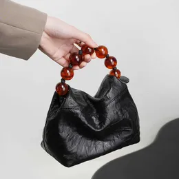 Estilo chinesa bolsa de contas única e de nicho de nicho de camada feminina de mão feminina lanchone