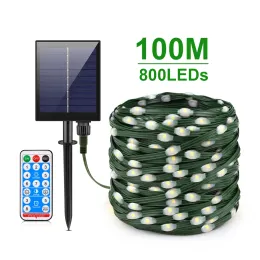 ديكورات جلدية LED Solar String Fairy Lights 100m عيد الميلاد أضواء مقاومة للماء في الهواء الطلق مصباح الطاقة الشمسية عالية القوة لديكور الحديقة