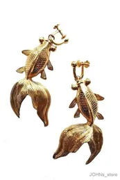 Dangle Kronleuchter Design einzigartige goldene Farbe Fisch Hängende Ohrringe Party Hochzeit ohne Ohrloch Schmuck Damen Ohrclip