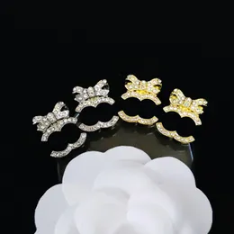 Designer nuovi orecchini a forma di arco di lusso 18k oro oro oro a piaciere in argento grattugiabile orecchini per ragazze di alta qualità orecchini intarsia