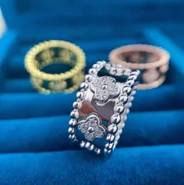 Дизайнерская горячая продажа Van Kaleidoscope Ring 925 Стерлинговое серебро, покрытое 18 тыс. Золотого издания, издания маленькой мужчина, счастливая трава, женщина с бархатной коробкой