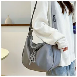 Affordable Canvas Shoulder Bag: Stylish, spacious, perfect for students. Shop now for casual fashion!