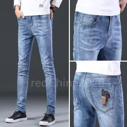 Autumn Novo logotipo bordado Cabeça masculina rasgada Slim Fit Elasticity Jeans Men's Straight Business Famamos famosos calças casuais clássicas Casual Troushers Wholesale V008