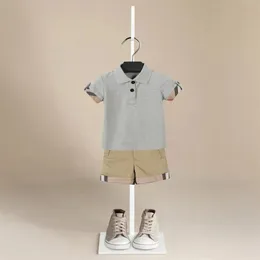 Barn pojke kläder sommar barn casual kostym polo skjorta kort ärm vit randiga shorts kläder 1-9 år barn kläder 240422
