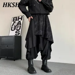سراويل الرجال السراويل HKSH ذات الطبقات الطيران بنطلون زر الظلام تايد الشرير غير منتظم تنورة رياضية فضفاضة كبيرة الحجم الأزياء HK0023