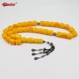 Strand Turkish Design Tasbih 33 żółte koraliki żywicy Tybetańskie srebrne frędzle