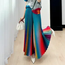Градиент женского плиссивного градиента с плиссированной и универсальной широкой шлебной штаны для ног Мода Осенний уличный стиль радужные брюки 240424