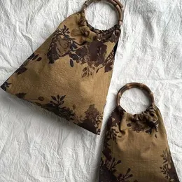 純粋なフレンチ刺繍新しい中国語スタイル竹ポータブル木製リングミニバッグレトロホリデーチョンサムフレッシュバッグ
