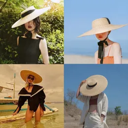 여름 라피아 여성 긴 리본 넓은 넓은 챙 모자 프랑스 스타일의 빈티지 선 스크린 큰 천연 밀짚 모자 소녀 보우 캡 240410