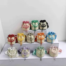 Luksusowy projektant Miozj Bucket Bag w tym roku nowy damski torebka słoma tkana modna litera sznurka jedna ramię Crossbody duża pojemność