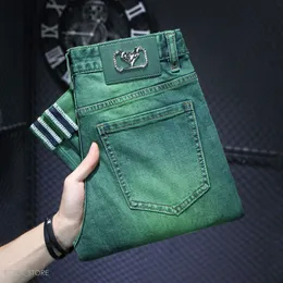 Designer kuegou jeans verde fantasma di alta fine end -fine per la primavera 2024 e l'autunno elastici elastici elastici piccoli piedi di pantaloni casual teers 25