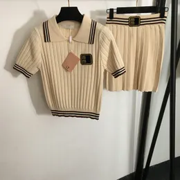 Schermo di gonna in stile scolastico da polo per maglione da maglione per maglione lettere jacquard tops galza di lussuosa tuta da maglia