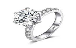 مع شهادة Silver 925 حلقات للنساء 20CT Round Cut Zirconia Diamond Solitaire Ring Band Band Bridal Joyas Z6979923