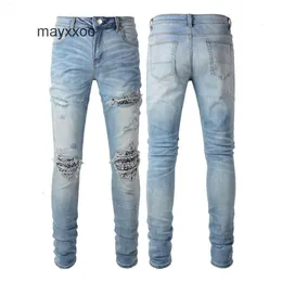 Mode jeans demin herrar kvalitet jean tunga mens amiirii tvättade perforerade hantverk högt lila läder 2024 snäll alyr